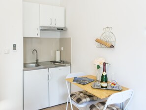 Studio (Studio Apartment 1) | Private kitchen | Fridge, electric kettle, cookware/dishes/utensils