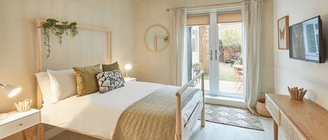 2 dormitorios, tabla de planchar con plancha, wifi gratis y ropa de cama