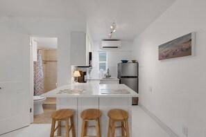 Fridge, microwave, oven, stovetop - 🌴Sleek Modern Condo @ Tropic Terrace | Ground Floor • Beachside • Heated Pool ➠ TT 21 (Treasure Island)