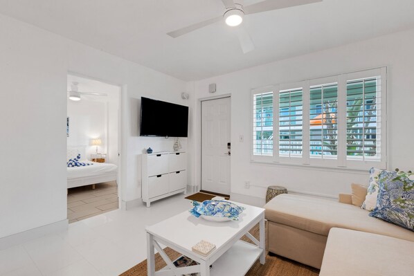 Desk, iron/ironing board, free WiFi, bed sheets - 🌴Sleek Modern Condo @ Tropic Terrace | Ground Floor • Beachside • Heated Pool ➠ TT 21 (Treasure Island)