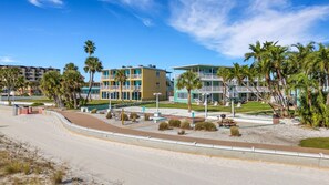 Exterior - Sunny Bright Coastal Getaway – 1-BR w/ Heated Pool & Steps to Sugar Sand Beach! (Treasure Island)