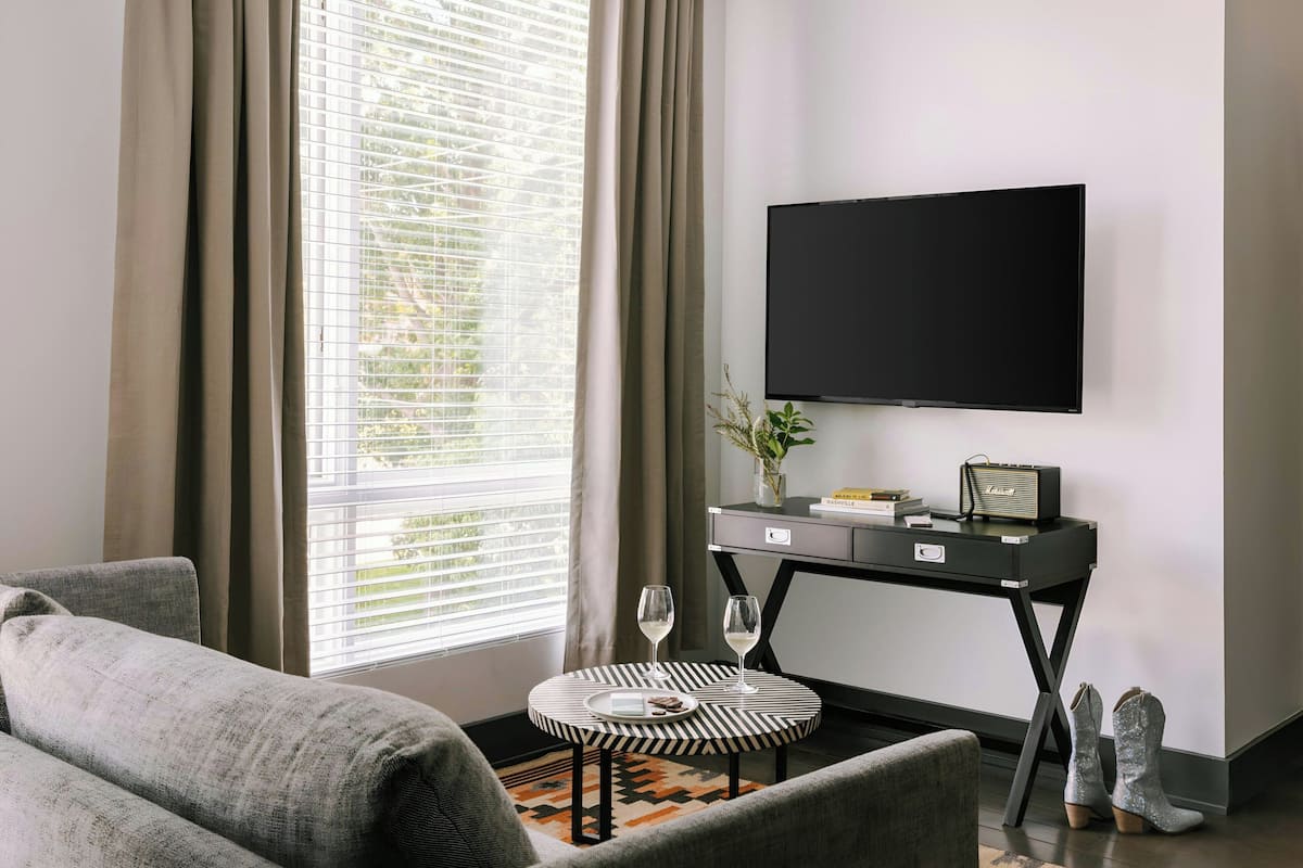40-inch flat-screen TV with digital channels, TV, streaming services