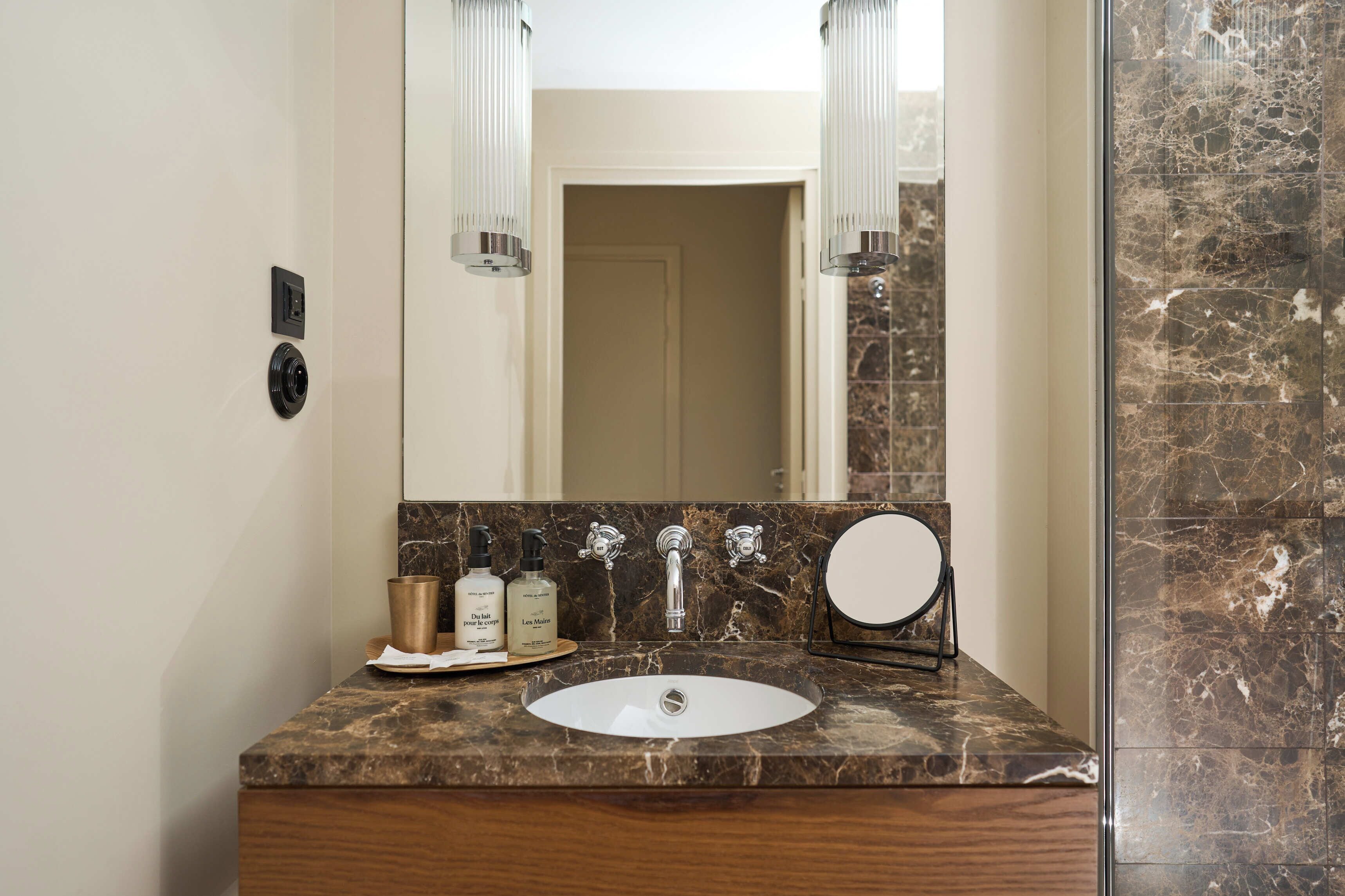 chambre supérieure french window | bathroom | designer toiletries, hair dryer, towels, soap