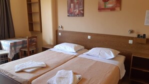 Comfort kamer, 1 twee- of 2 eenpersoonsbedden, uitzicht op tuin