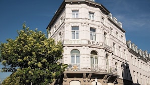 A multi-story building with the sign "HOTEL BEAUJOUR" indicating it is a hotel. - Beaumont (Maastricht)