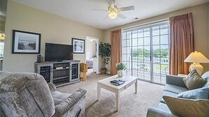 Condo, 2 Bedrooms | Living room - Barefoot Ironwood by North Beach Realty (North Myrtle Beach)