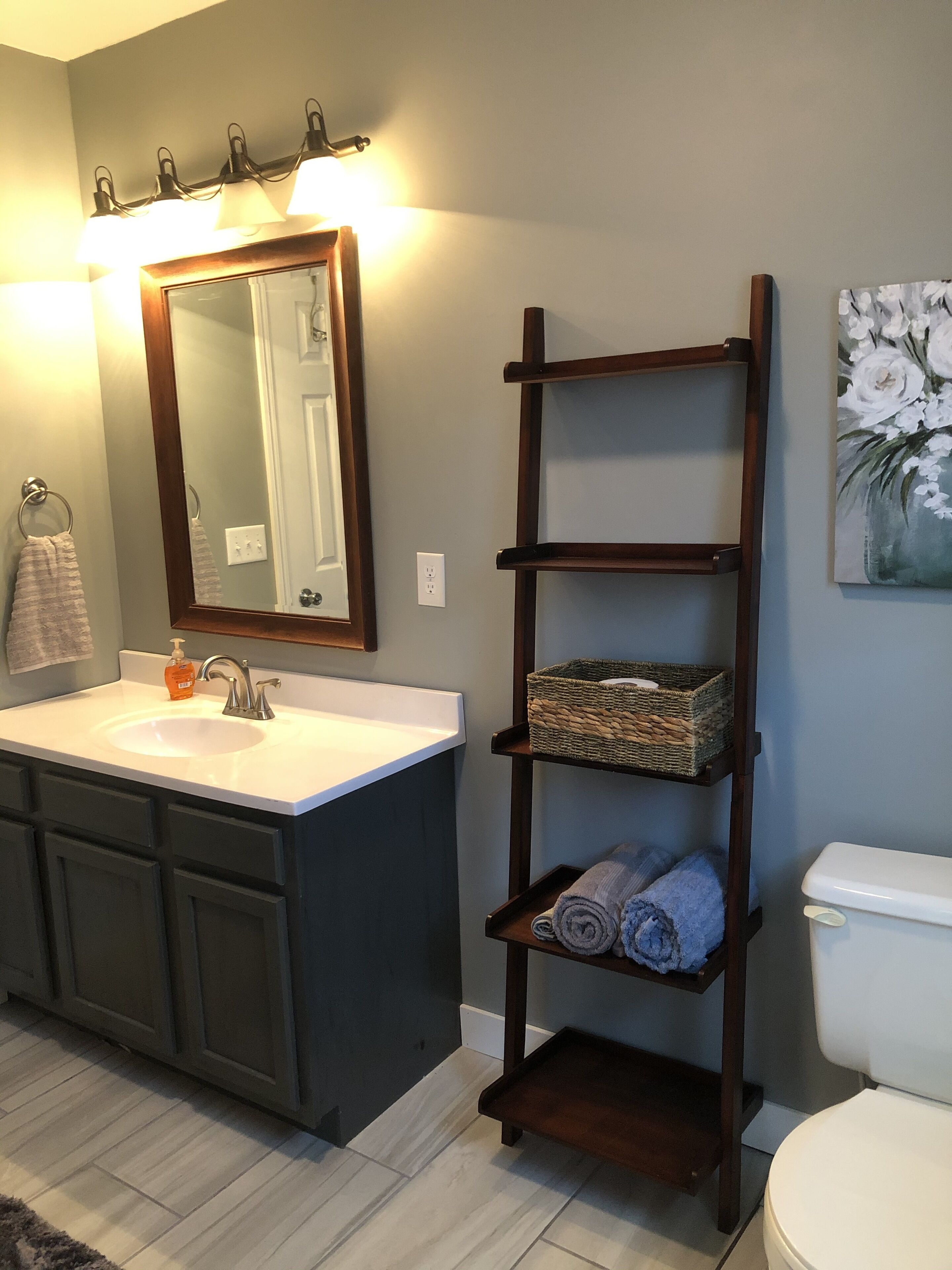 Combined shower/tub, hair dryer, towels, toilet paper