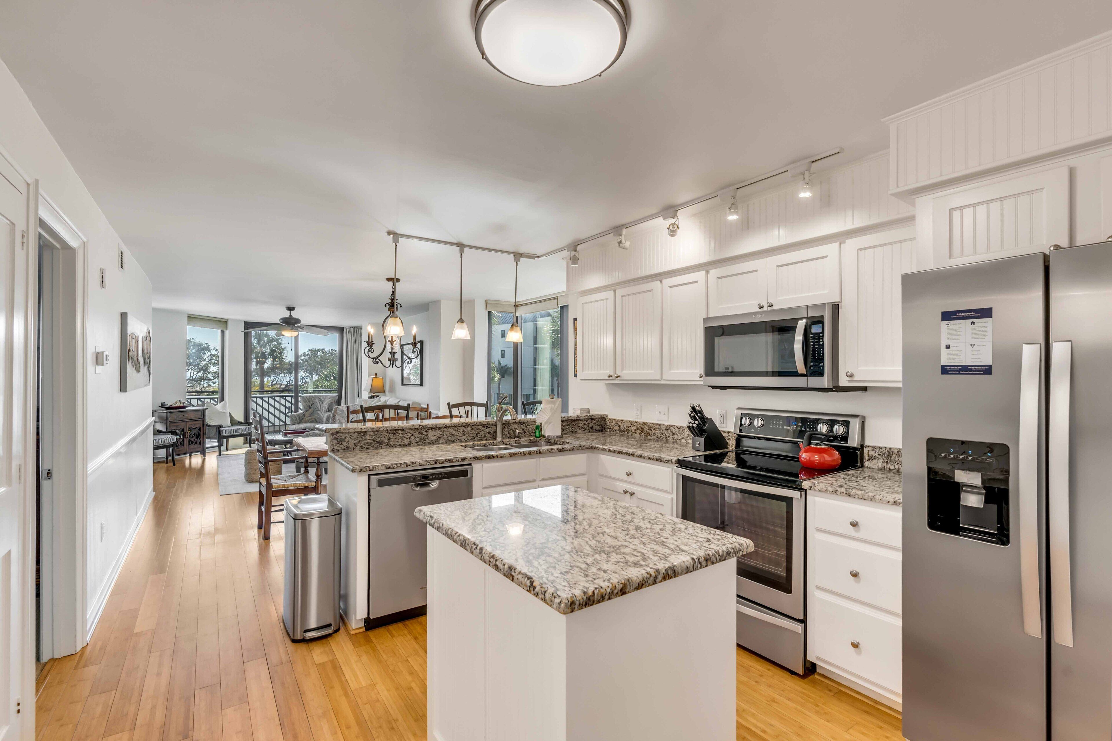 Fridge, dishwasher, coffee/tea maker, cookware/dishes/utensils