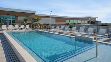 Outdoor pool, open 5:00 AM to 11:00 PM, sun loungers