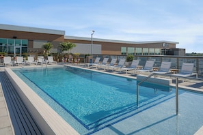 Outdoor pool, open 5:00 AM to 11:00 PM, pool loungers