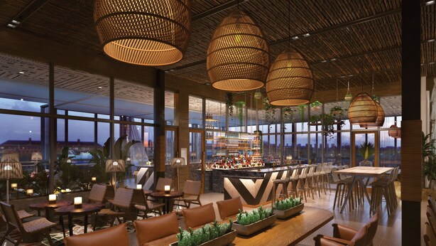 A spacious restaurant with high ceilings, large windows, and a bar area. - Element by Marriott Tampa Midtown (Tampa)