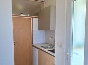 Apartment (One Bedroom Apartment 3) | Private kitchen | Fridge, coffee/tea maker