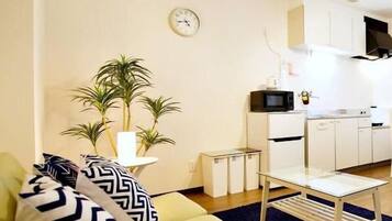 Maisonette Apartment, Non Smoking | Living area | Flat-screen TV