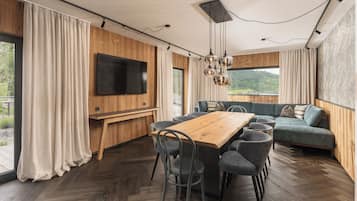 Deluxe Apartment, Terrace, Mountain View | Living area | TV