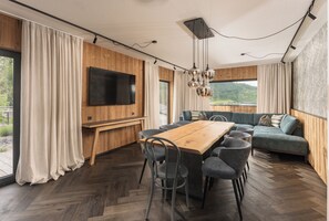 Deluxe Apartment, Terrace, Mountain View | Living area | TV - Erzherzog Johann Alpin Style Hotel - Adults Only, Premium Garni (Schladming)