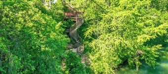 Beautiful condo on the Guadalupe River in downtown New Braunfels with a pool.