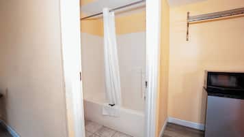Economy Single Room, Smoking | Bathroom | Combined shower/tub, hair dryer, towels, soap