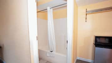 Economy Single Room, Smoking | Bathroom | Combined shower/tub, hair dryer, towels, soap