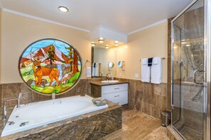 Combined shower/tub, hair dryer, towels, soap