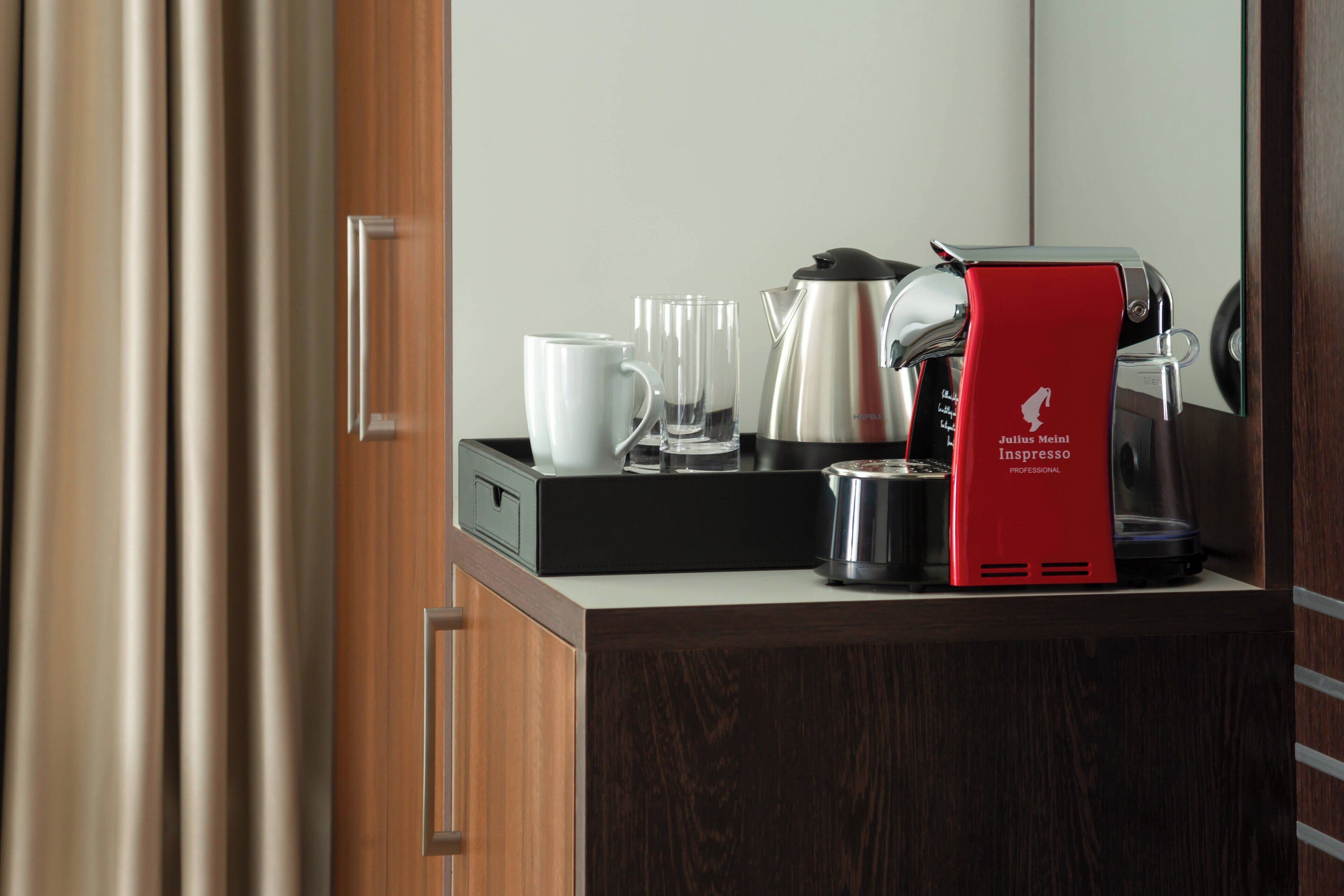 suite, 1 king bed with sofa bed, city view | minibar, in-room safe, desk, laptop workspace