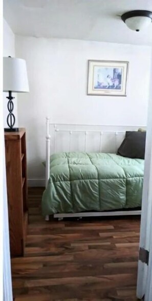 1 bedroom, desk, iron/ironing board, bed sheets