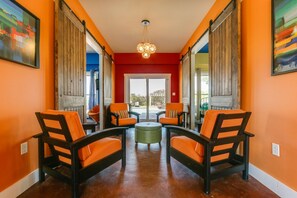 Ooh La La | Living room | Flat-screen TV, fireplace, DVD player - Ooh La La (Port St. Joe)