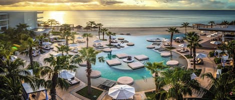 Outdoor pool, pool umbrellas, sun loungers
