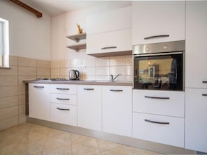Fridge, microwave, oven, cookware/dishes/utensils