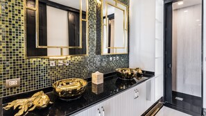 Separate tub and shower, rainfall showerhead, free toiletries