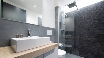 Apartment, Multiple Beds, Kitchenette, City View | Bathroom sink