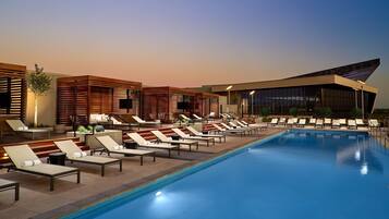 Outdoor pool, open 6:00 AM to 10:00 PM, cabanas (surcharge)