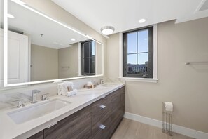 Shower, rainfall showerhead, hair dryer, towels