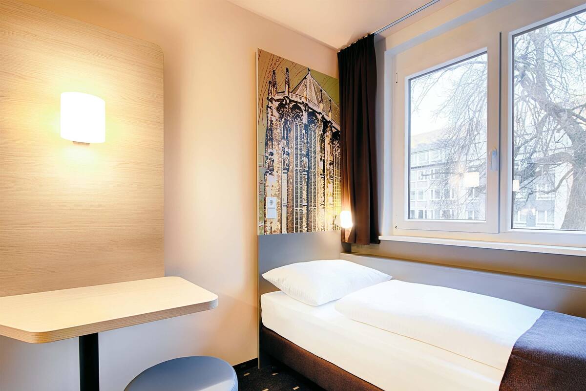 Habitación individual | 1 dormitorio, escritorio, wifi gratis y ropa de cama