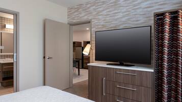 Suite, 1 Bedroom, Non Smoking | Desk, iron/ironing board, free cots/infant beds, bed sheets