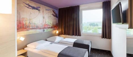 Chambre avec lits jumeaux