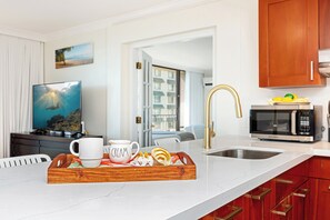 Fridge, microwave, stovetop, coffee/tea maker
