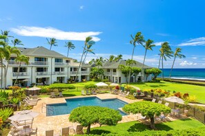 A resort with a pool, multiple guest rooms, and a view of the ocean. - Poipu Kapili 16: Ocean Views; Fully Updated-New Furnishings, Split ACs & Windows (Koloa)