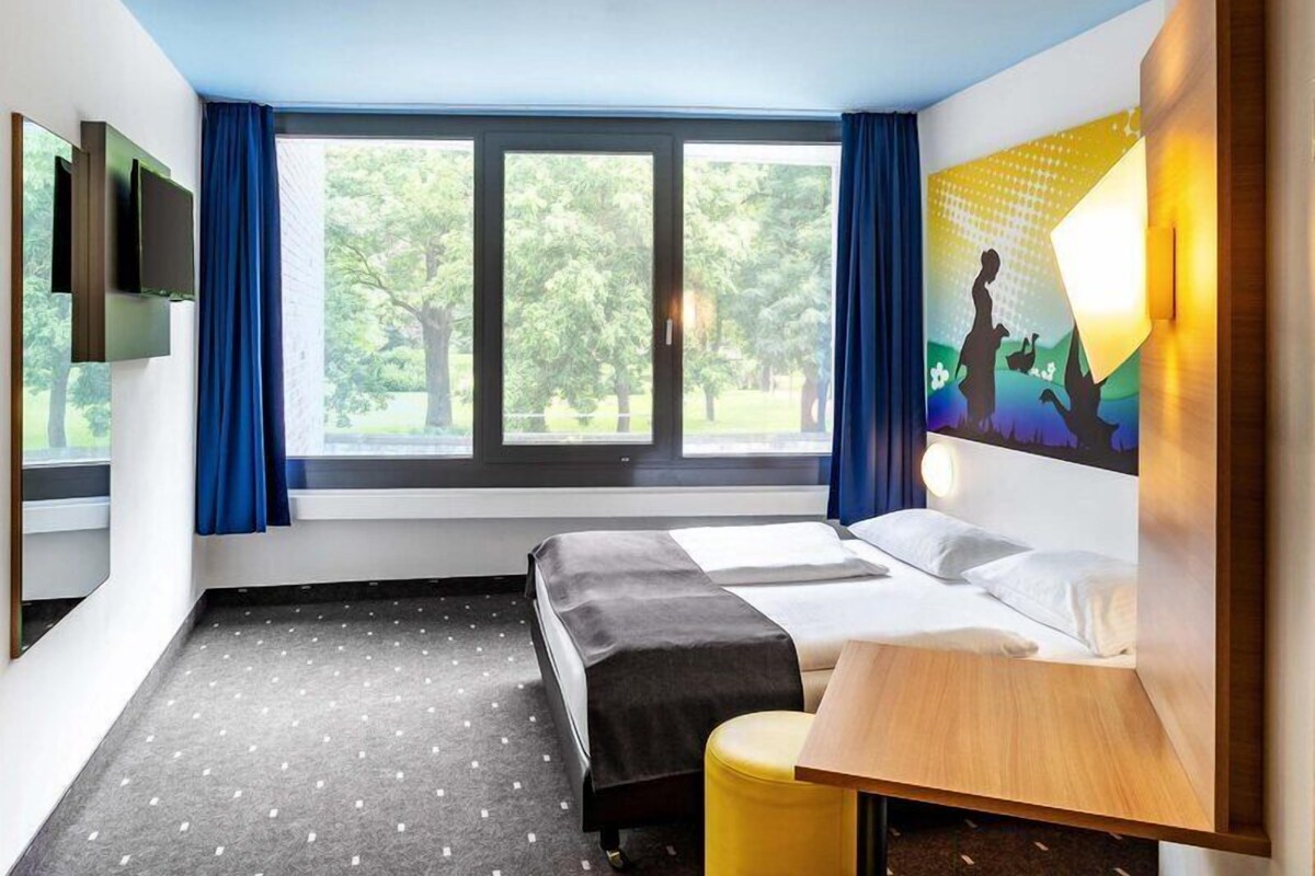 Tweepersoonskamer | Een bureau, gratis wifi, beddengoed