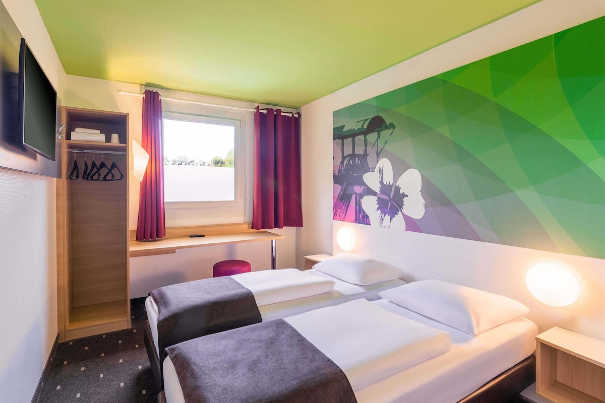 Quarto duplo | 1 quarto, escrivaninha, quartos Ć prova de som, Wi-Fi de cortesia