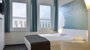 Habitación con 2 camas individuales | Escritorio, sistema de insonorización, wifi gratis y ropa de cama