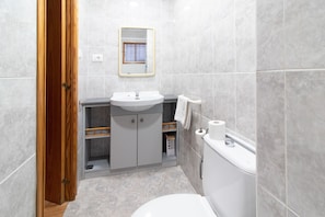 Bathtub, hair dryer, towels