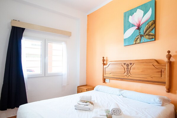 4 habitaciones, tabla de planchar con plancha, wifi y ropa de cama 