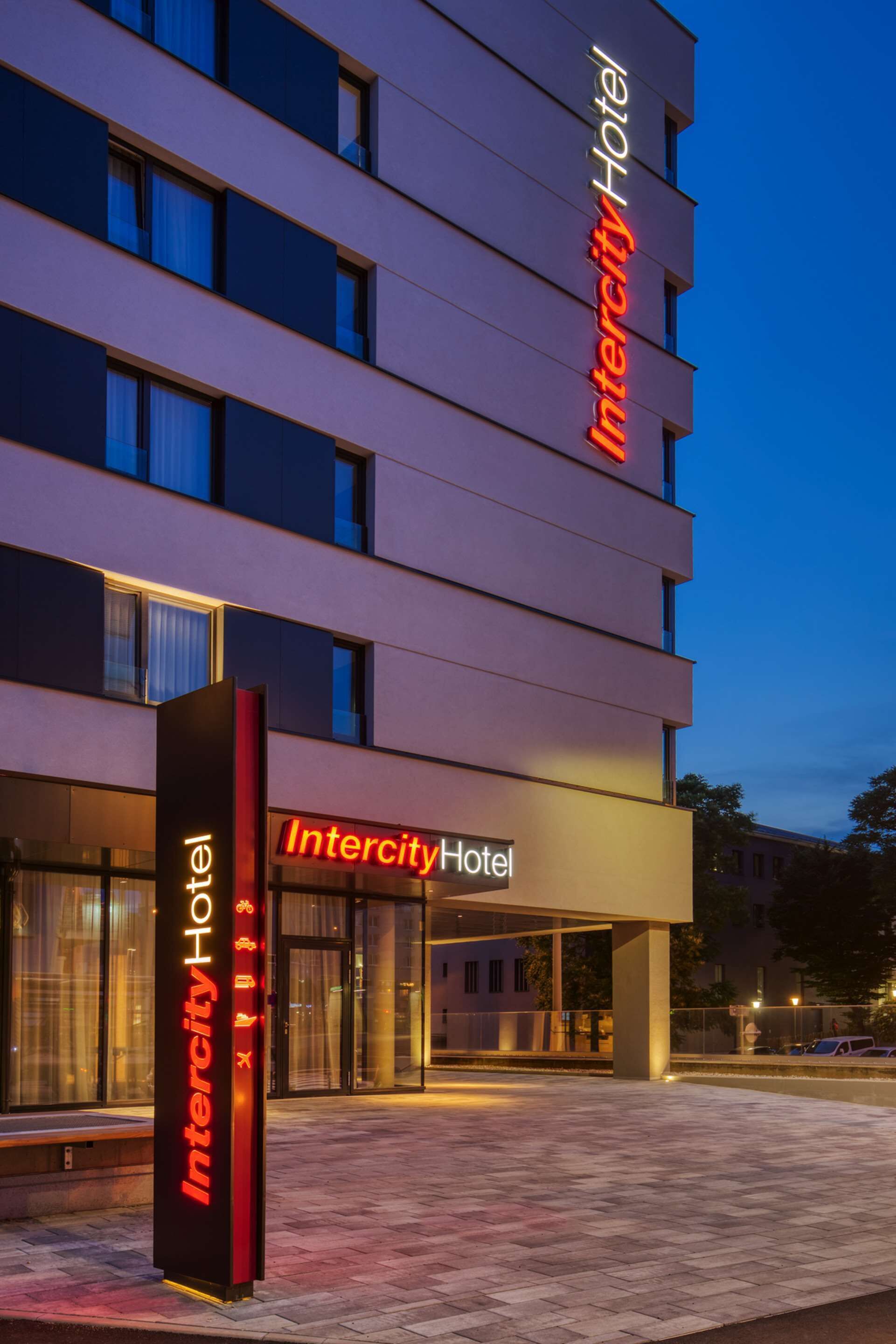 A modern Intercity Hotel with a prominent entrance and signage.