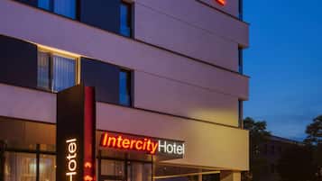 A modern Intercity Hotel with a prominent entrance and signage.