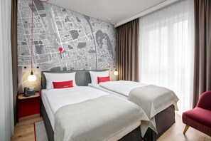 Hypo-allergenic bedding, in-room safe, desk, blackout curtains