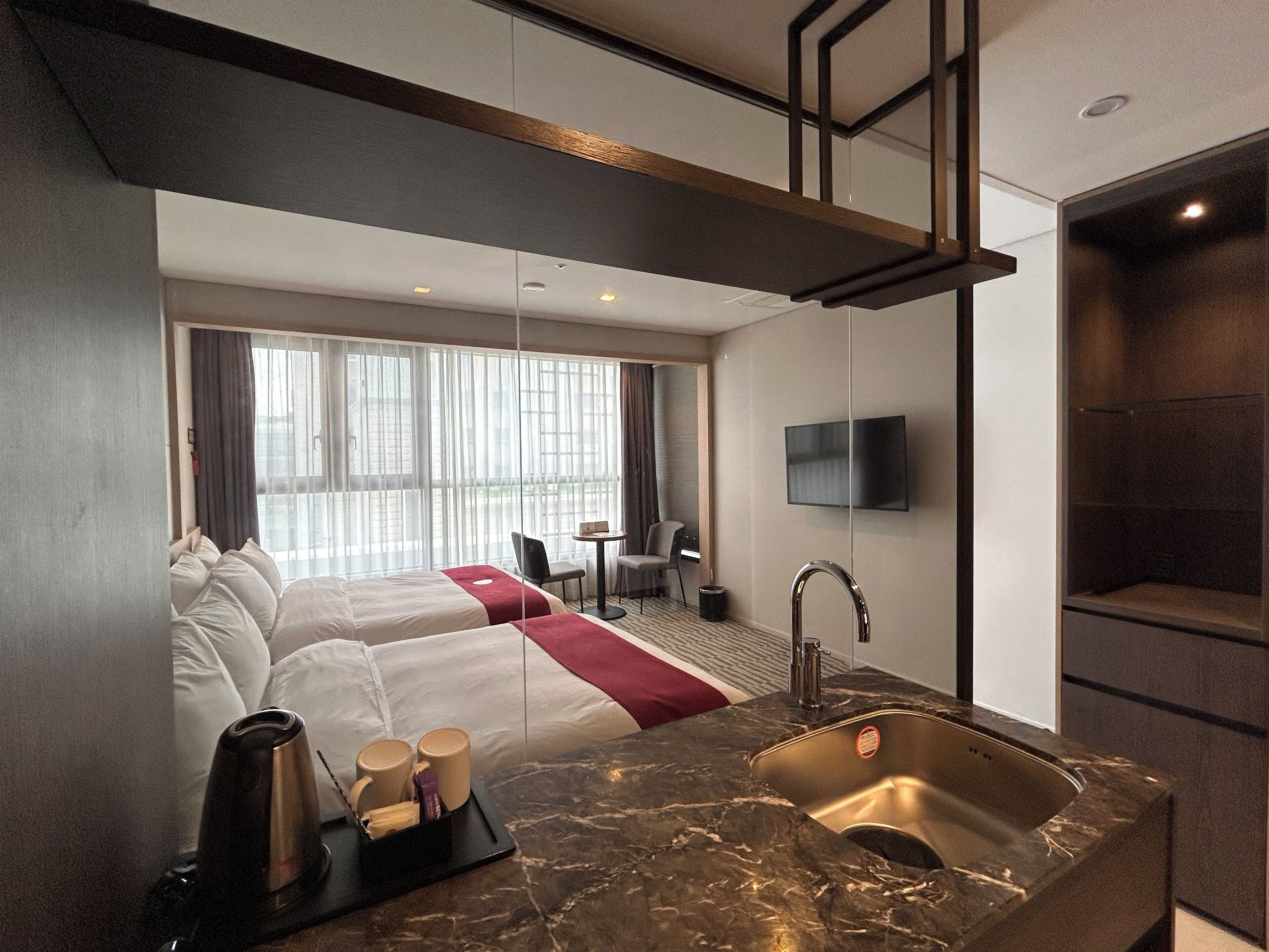 junior suite, 2 double beds, non smoking, city view | 1 bedroom, desk, laptop workspace, blackout curtains