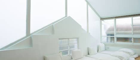 Habitación cuádruple superior | Escritorio, cortinas blackout, camas extra y wifi gratis