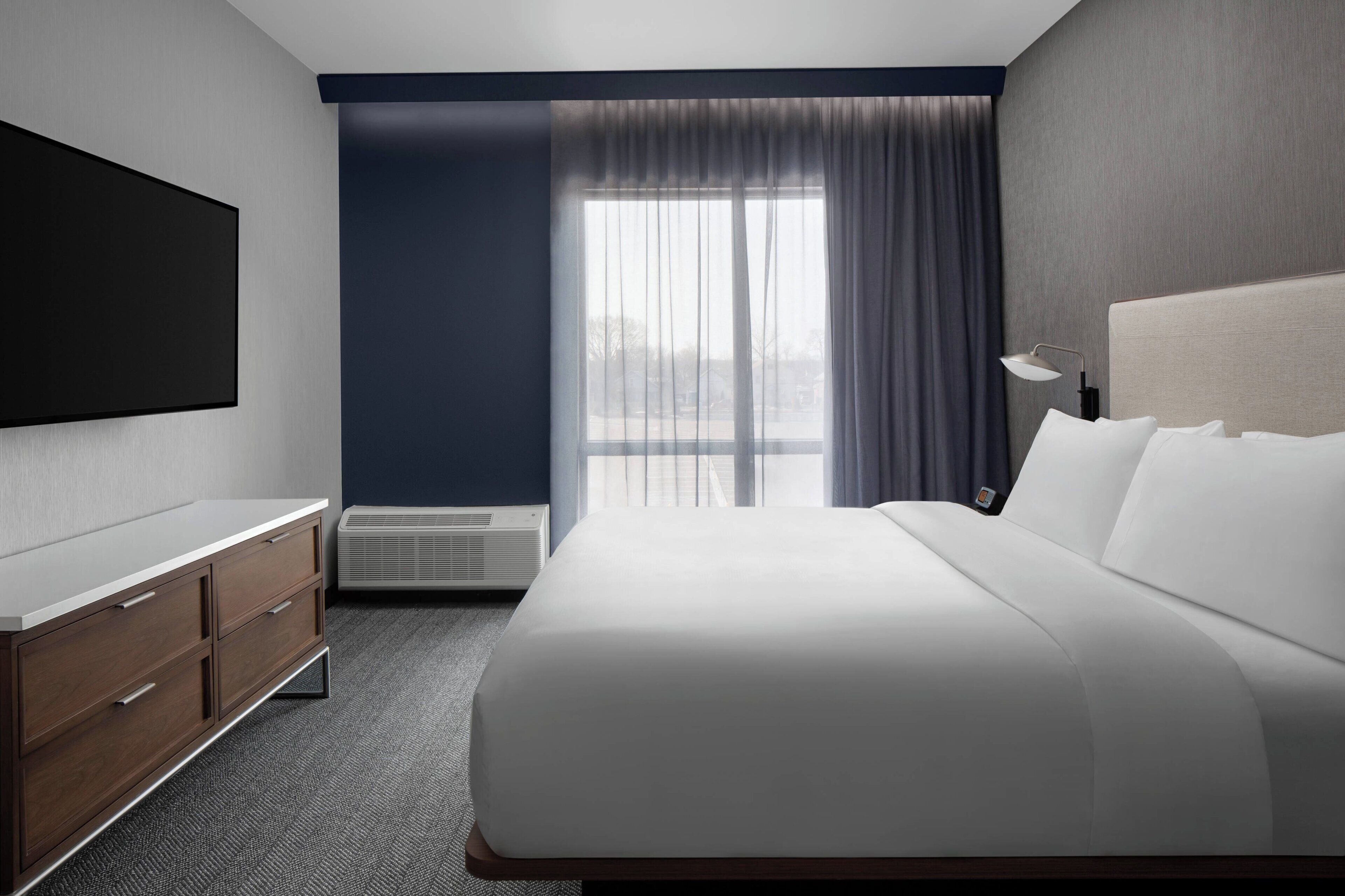 Suite, 1 Bedroom | Desk, laptop workspace, blackout drapes, iron/ironing board