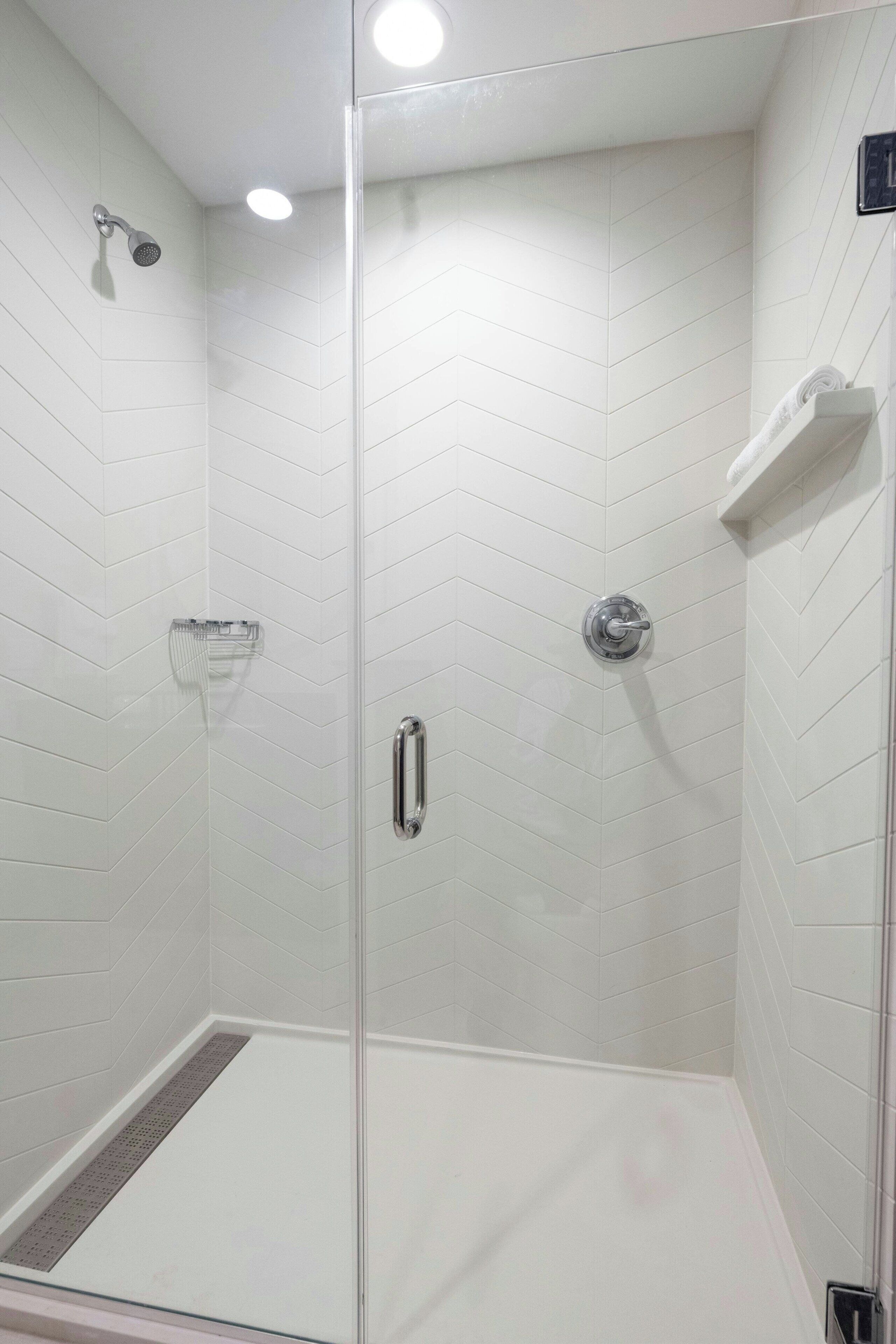 room, 1 king bed | bathroom | shower, free toiletries, hair dryer, towels