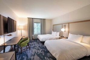 Tabla de planchar con plancha, wifi gratis y ropa de cama